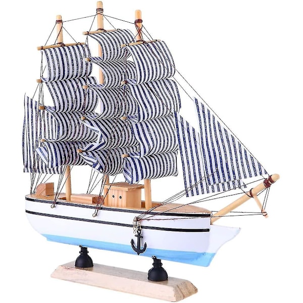 Trämodell av en slät segelbåt