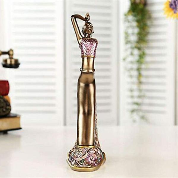 Skulptur av en vacker staty i etnisk stil, utsökt dansande skönhet, kreativ heminredning, festivalgåva, hantverk i resin