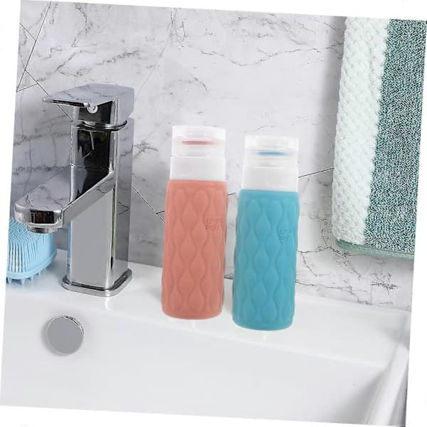 Reseflaskor Set om 4 100 ml Silikon Reseförpackning Pump Schampo Balsam Flaskor