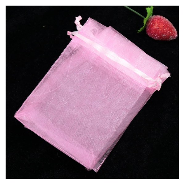 Lahjapussi 10 kpl läpinäkyviä organzapusseja Hääkarkkirasiapakkaus Syntymäpäiväjuhlien lahjarasiapakkaus useaan käyttöön (väri: vaaleanpunainen, lahjapussin koko: 7x9