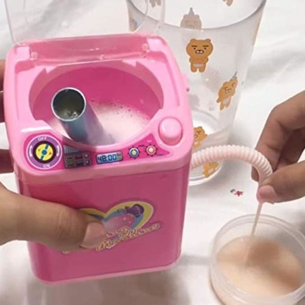 Mini-meikkiharjan puhdistuslaitteen simulointiautomaattipuhdistuspesukone sienelle ja puuterilelulle