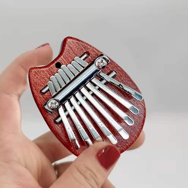 Tommelklaver Mini Fingerklaver Bærbar Musikinstrument Musikinstrumenter (1 stk, Træfarve)