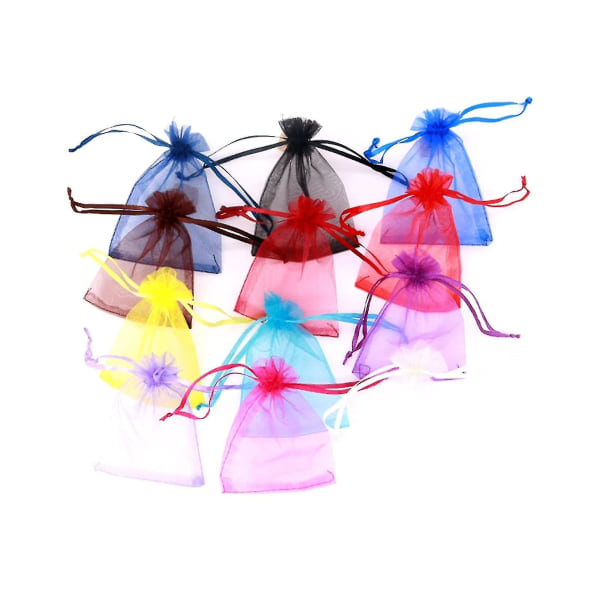Lahjapussi 10 kpl läpinäkyviä organzapusseja Hääkarkkirasiapakkaus Syntymäpäiväjuhlien lahjarasiapakkaus useaan käyttöön (väri: vaaleanpunainen, lahjapussin koko: 7x9