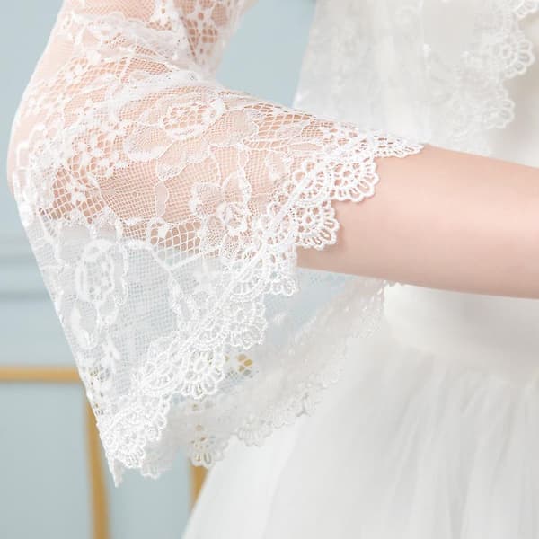 Bröllopsklänning i spets med bolero-överdel COLOR