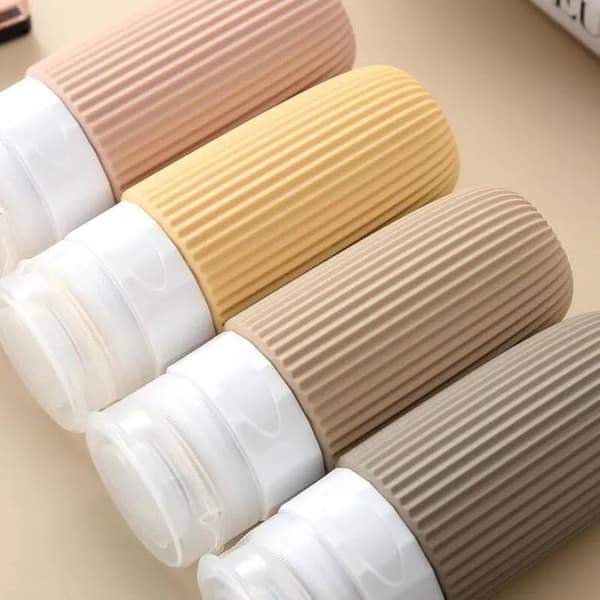 CAA-godkända 60 ml silikonreseflaskor, läckagesäkra klämbara, 4-pack, BPA-fria för toalettartiklar