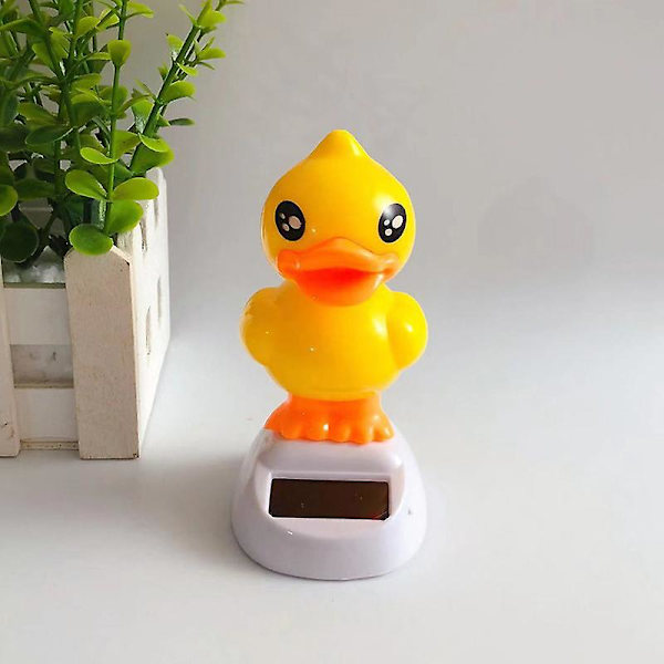 Aurinkoinen sarjakuvahahmo koriste autokojelautaan dynaaminen tanssi eläin pöytäkoriste kotiin työpöydälle toimistoon[HkkK] Yellow Duck