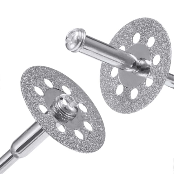 20 kappaletta 22 mm timanttikatkaisulaikkaa, 4 kappaletta 3 mm istukkaa ja 2 kappaletta ristipääkristallimeisseliä Dremel-pyörötyökaluihin UUSI3[HK]