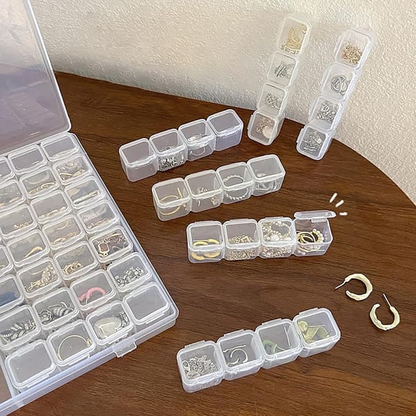 Gennemsigtig smykkeopbevaringsboks med 56 rum, plastikorganizer til øreringe