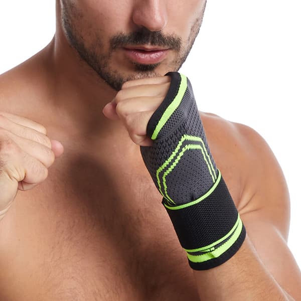 Armband med tryckrem för sportskydd och justerbart stickat stöd