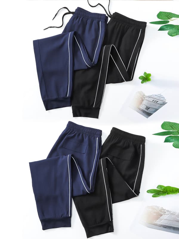 Joggebukse for menn med refleksstriper, lommer og elastisk linning for løping og trening