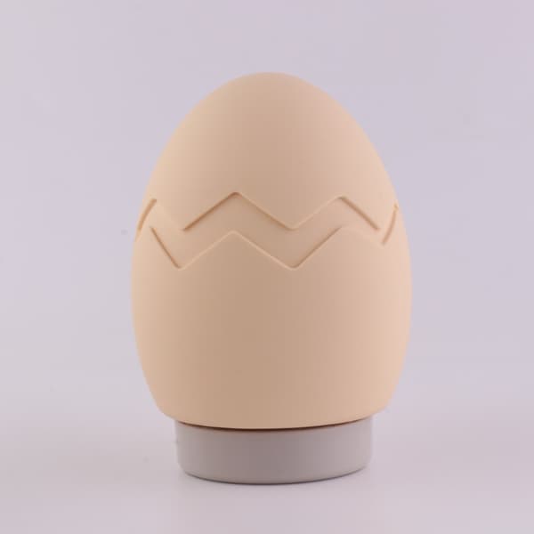 Vannfylt eggformet håndvarmepose, kvinnelig magevarmer, varm kompress
