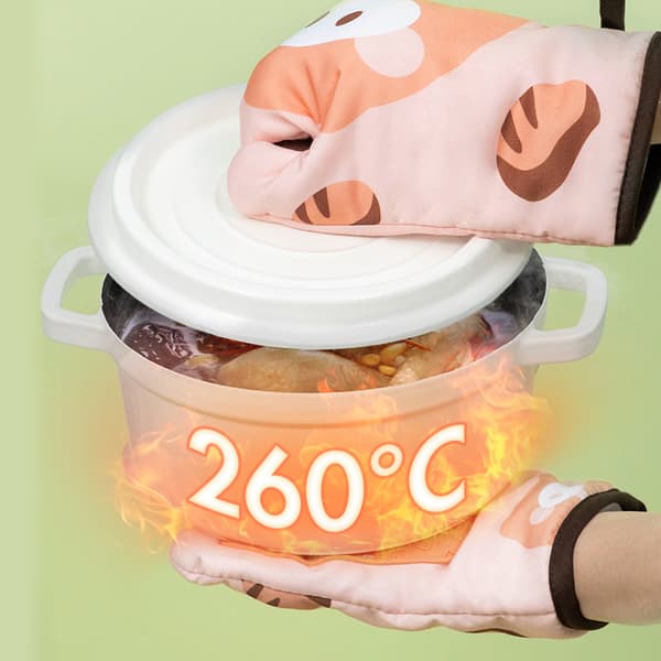 Ett par köksugnshandskar, värmeisolering, brännskydd