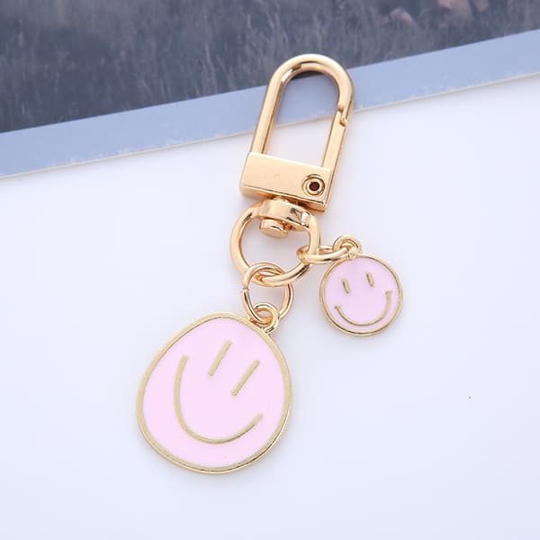 Nuttede søde glade udtryksnøgleringe til kvinder 2-pak Sm