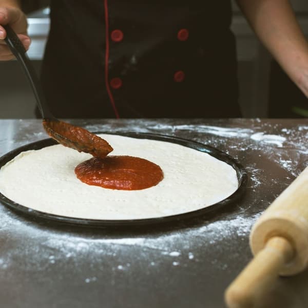 Round pizza tray with perforated bottom and non-stick coating 341