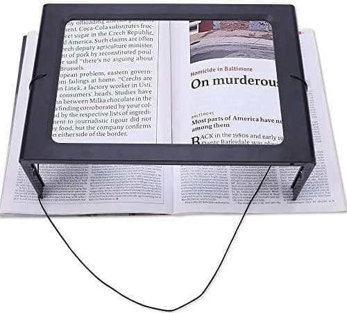 En bit svart handsfree-förstoringsglas med stor rektangulär Fu