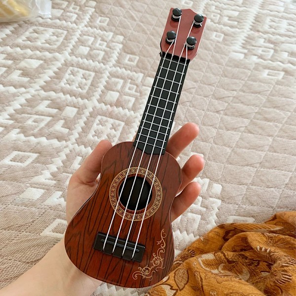 Mini gitarr 4 strängar klassisk ukulele gitarr leksak musikinstrument för barn barn nybörjare tidig utbildning liten gitarr