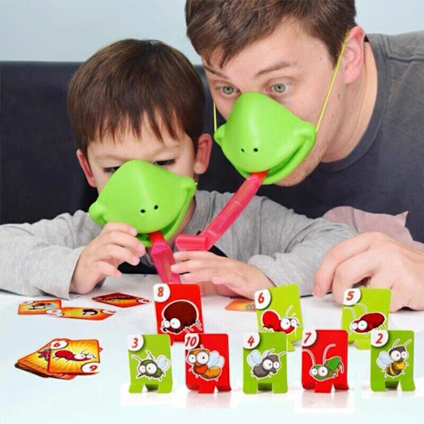 Groda som spottar tunga brädspel som knuffar kortspel bugfångstspel förälder-barn-spel flerspelarspel sällskapsspel Four Player Battle