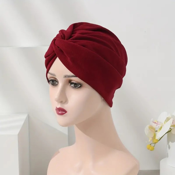 Stretch Turban Mössa med Korsa Twist Design Bekväm mångsidig huvudbonad för damer Pink