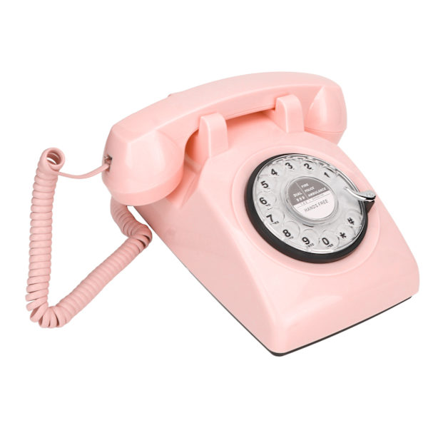 Sladdad retro-telefon med roterande skiva, gammaldags vintage hemtelefon med mekanisk ringsignal och högtalarfunktion, rosa