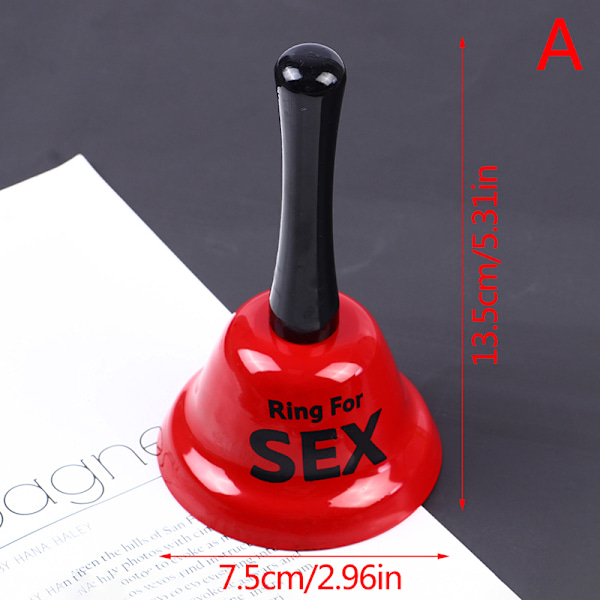 Red metal bell with ring in hand Manual rattle six for ring