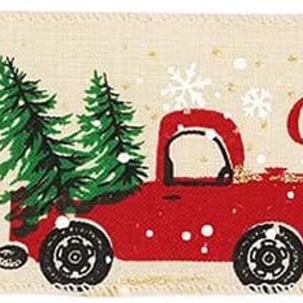 Ruller af julebånd med metalkant med \"Glædelig Jul Gran og Lastbil\" til kranse