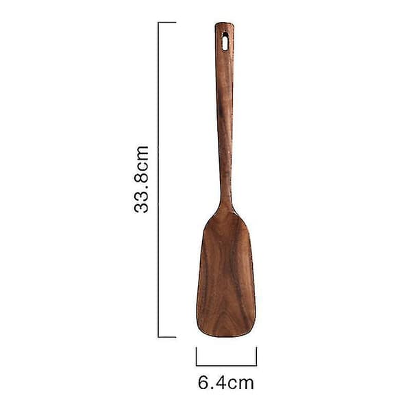 Träköksredskap för köket, 2 st träskedar och stekspade för matlagning, elegant, köksredskap används