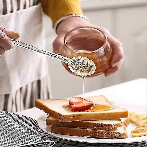 2 stk. honningdypperpinde i glas, rørepinde, serveringsske, honningske, dypper, rørepind, honningstav