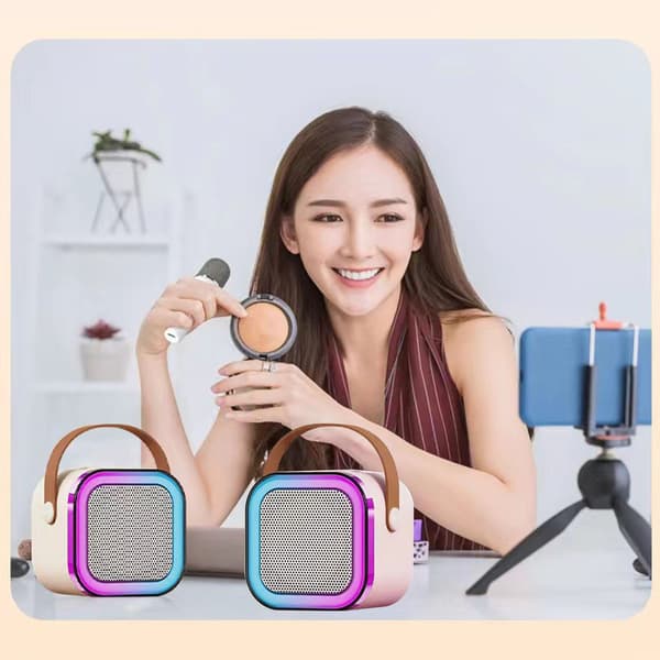 Mini Karaoke Machine Karaoke Speaker with Wireless Microphone Light Effects Portable Karaoke System with Battery for Home Use Pink with 1 Microphone 0.5 0.5