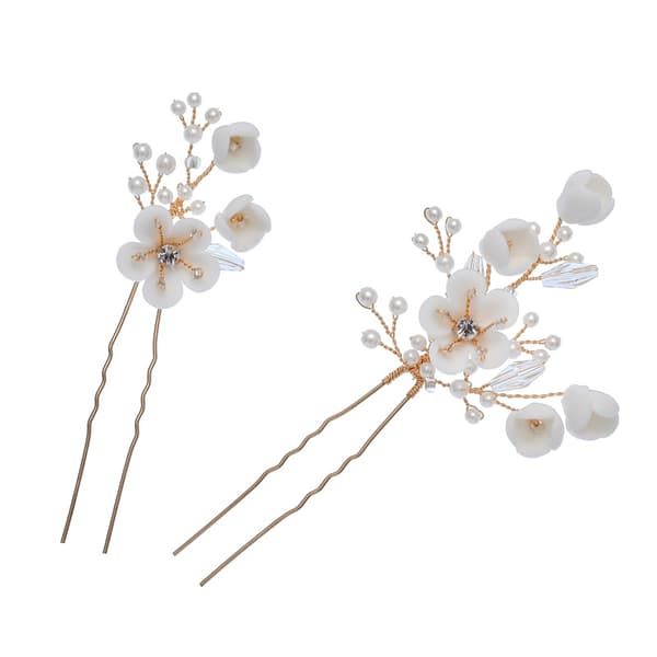 En smule blondt hår med to bryllupshår accessories perle