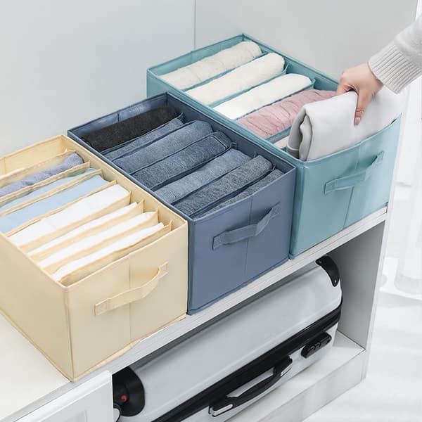 A jeans cabinet organizes clothes in the wardrobe and is foldable