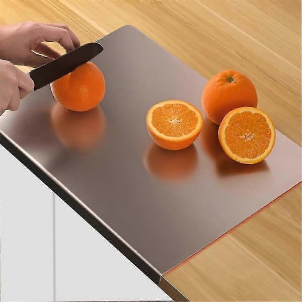 Non-slip stainless steel cutting board with edge and silicone