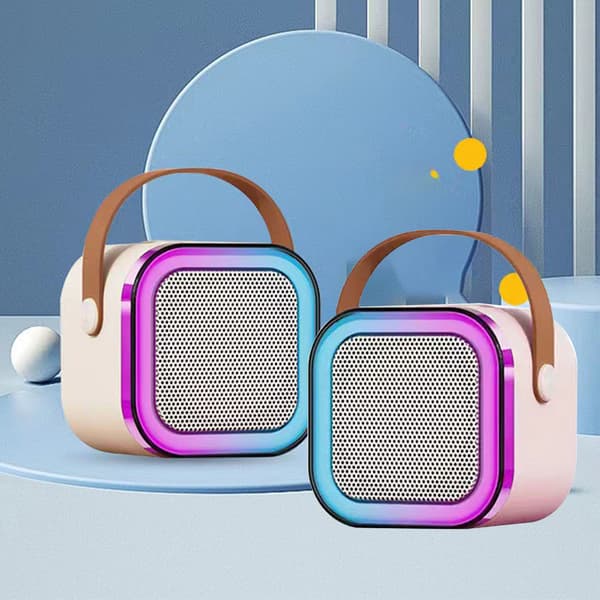 Mini Karaoke Machine Karaoke Speaker with Wireless Microphone Light Effects Portable Karaoke System with Battery for Home Use Pink with 1 Microphone 0.5 0.5