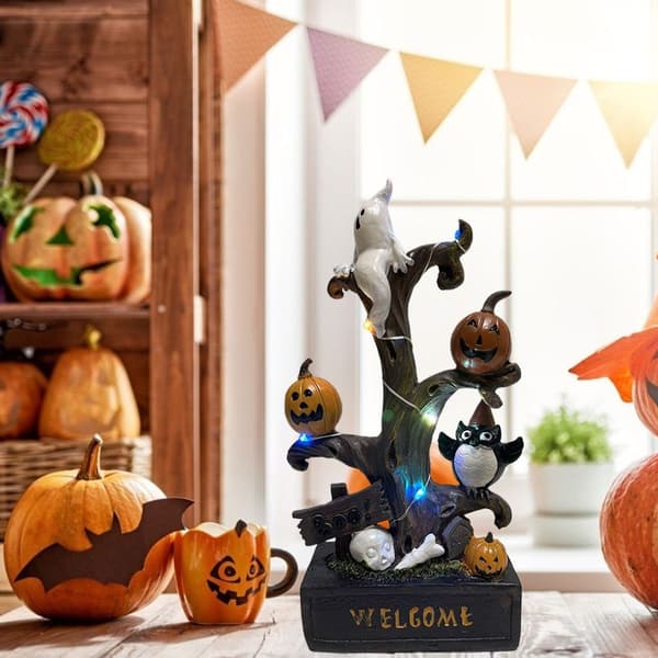 Halloween-hartsipatsas kurpitsavalopöydällä KLB