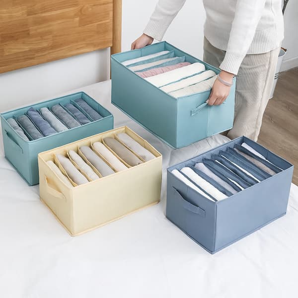 A jeans cabinet organizes clothes in the wardrobe and is foldable