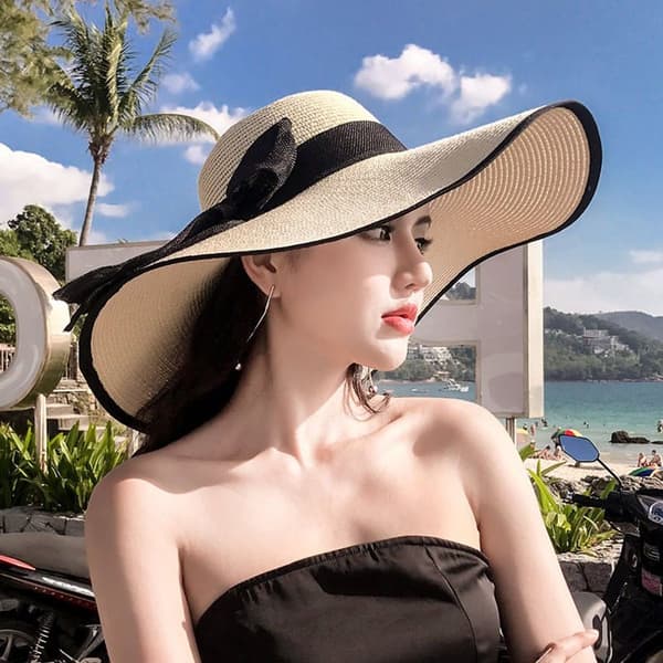 Dame solhat strand stor skygge solbeskyttelse ferie mode