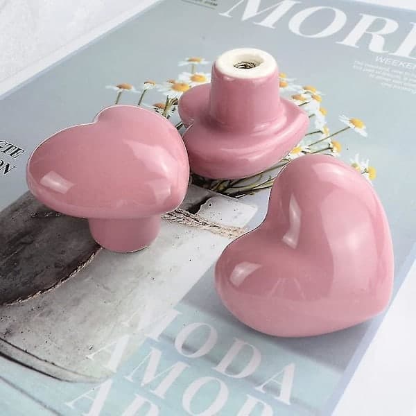 Sæt med 8 rosa hjerteformede keramiske knopper til køkkenskabe i børneværelse