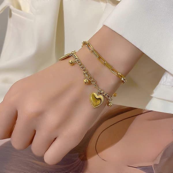 Guldbelagt armbånd i rustfrit stål med flere kæder og charms i form af kugle og hjerte til kvinder