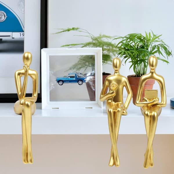 3 st gulddekorerade sittande tänkande statyer abstrakt skulptur, böcker