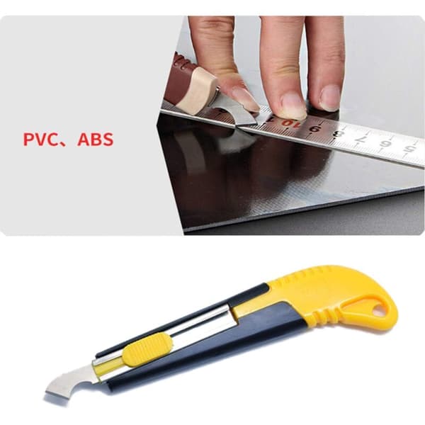 Two snap-off blade knives and glasses, yellow and black, including 20 replacement blades