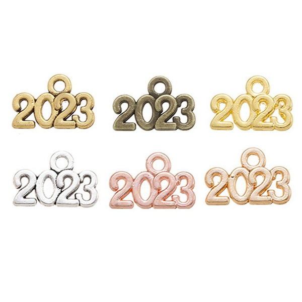 100 stk. Souvenirvedhæng 2023 kvast STYLE-2 STYLE-2 Style-2