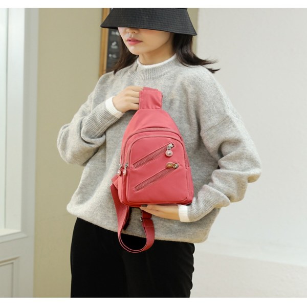 Crossbody-tasker Brysttaske D D D