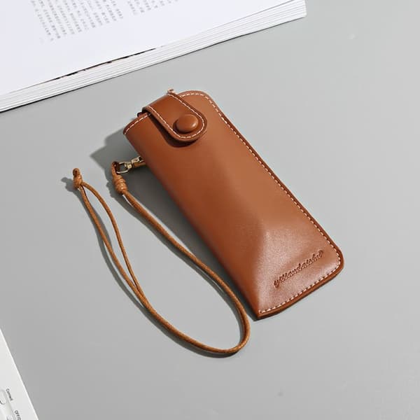 Case Aurinkolasilaukku RUSKEA brown