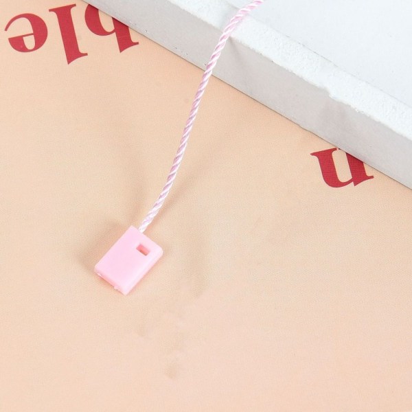Hang Tag String Snap Lock Pin Loop Fästelement Krokband