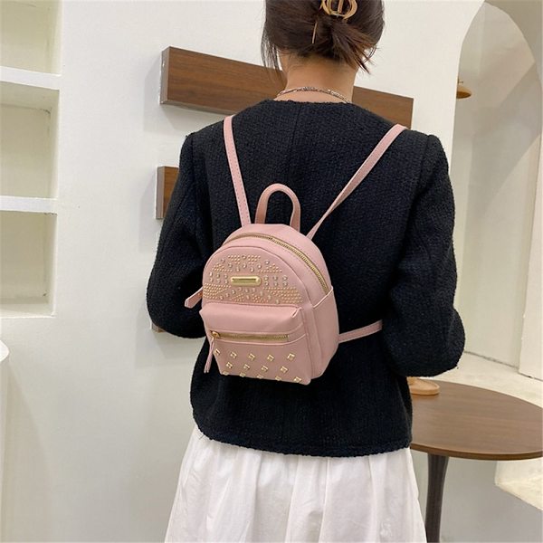Mini Reput Pieni reppu MUSTA black