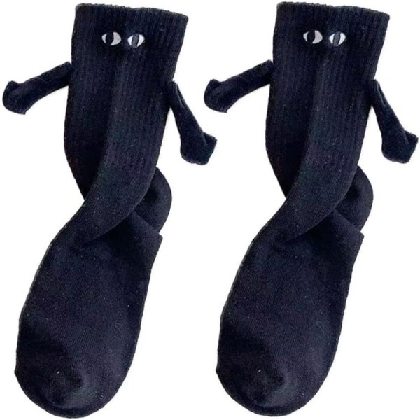 Hauska pari pitelee sukkia kädestä pitäen Sukka MUSTA ILMAN Black without Magnetic-without Magnetic