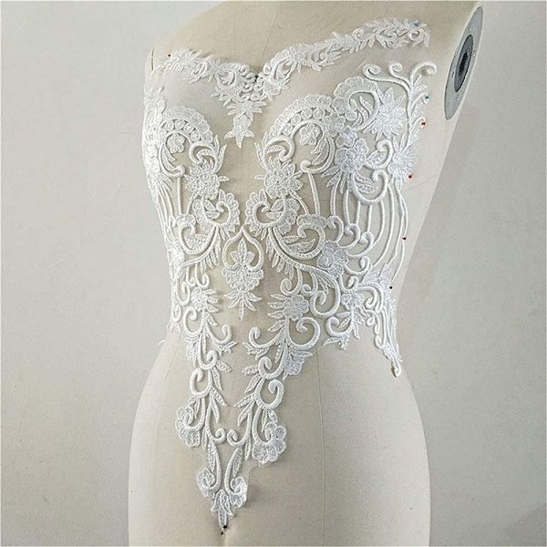Spetsapplikationer blomlapp broderad