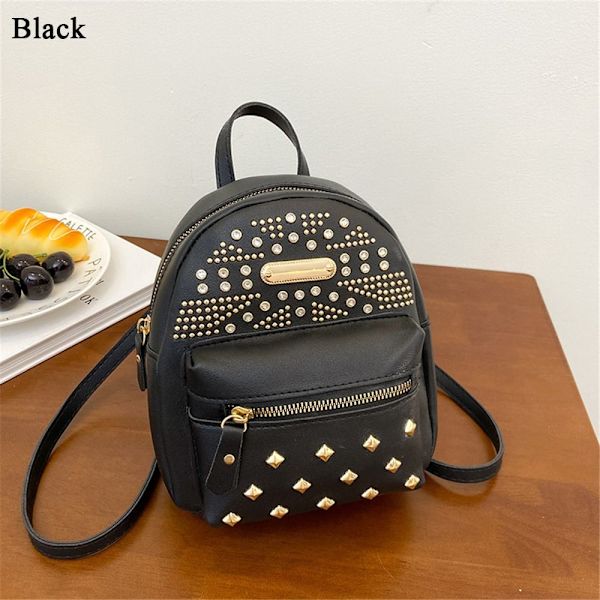 Mini Reput Pieni reppu MUSTA black