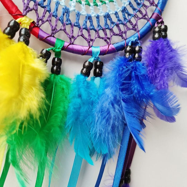 Unensieppaajat Värikäs höyhenen Unesieppari Rainbow Feather