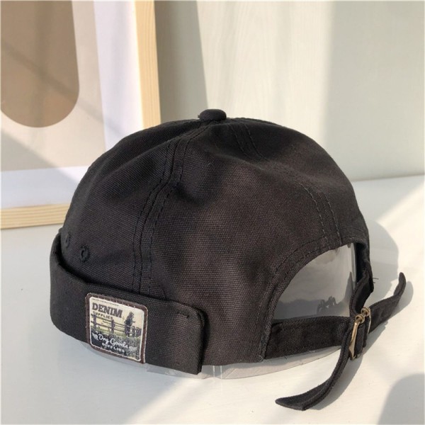 Miesten Docker Cap Retro Dome Meloni MUSTA black