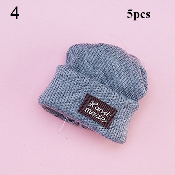 5 st Dockhatt stickad mössa 4 4 4